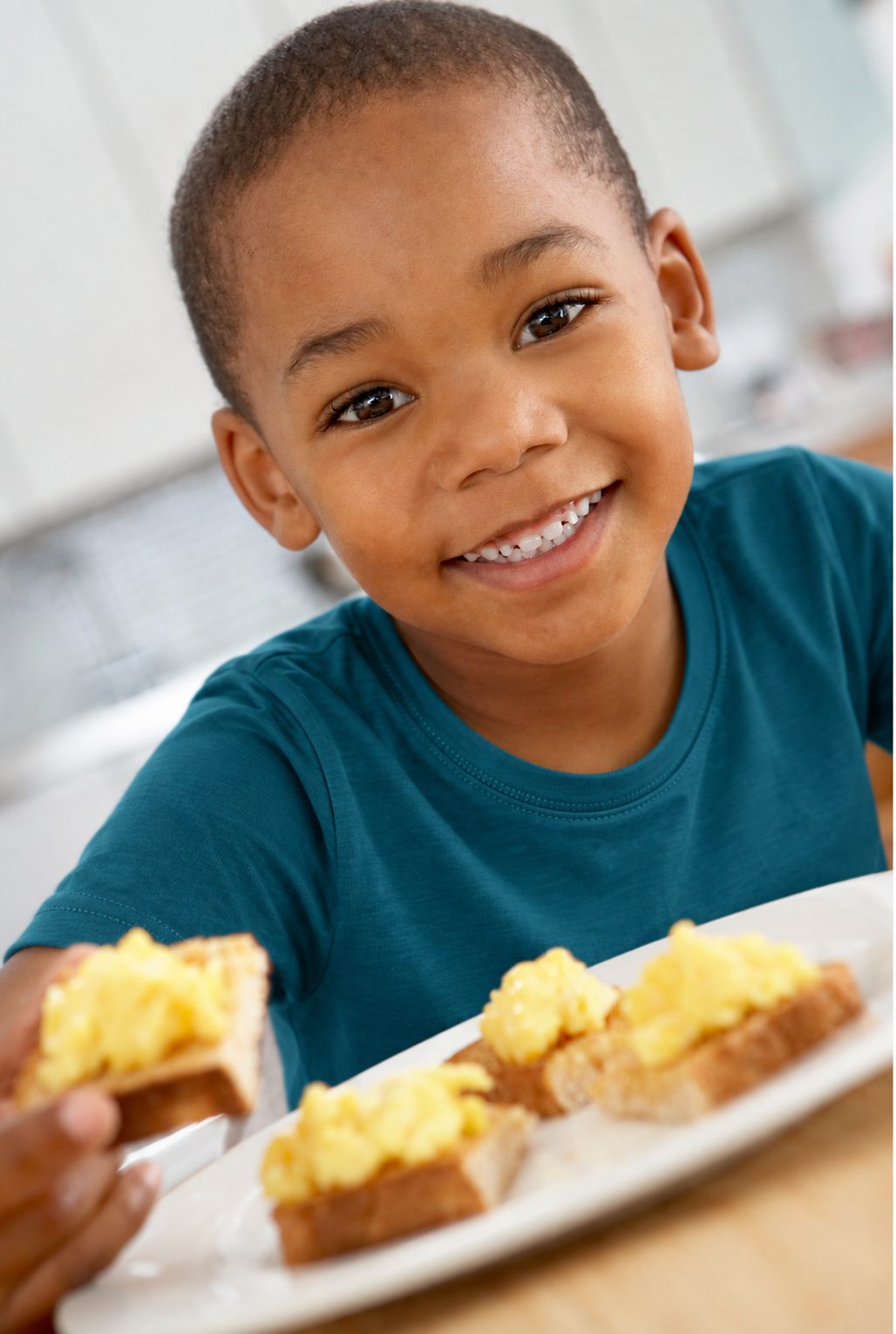 Child eating breakfast